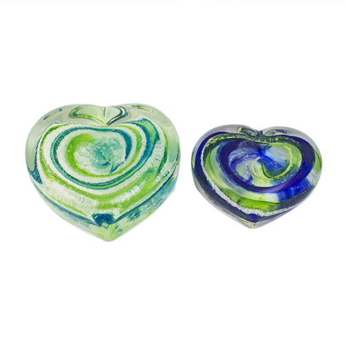 Two glass blown large and medium heart pieces with various shades of coloura inside