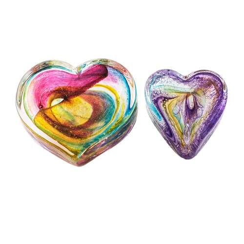 Two assorted blown glass hearts with different colored lines inside